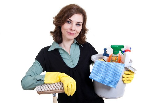 Builders cleaning service in Watford polishing windows and floors