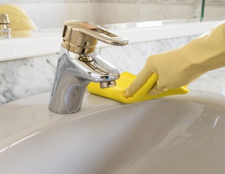 Professional Watford cleaner handling kitchen cleaning tasks